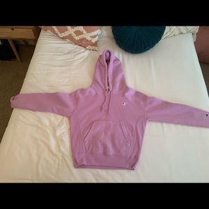 A matching sweat suit set, that is from champion.